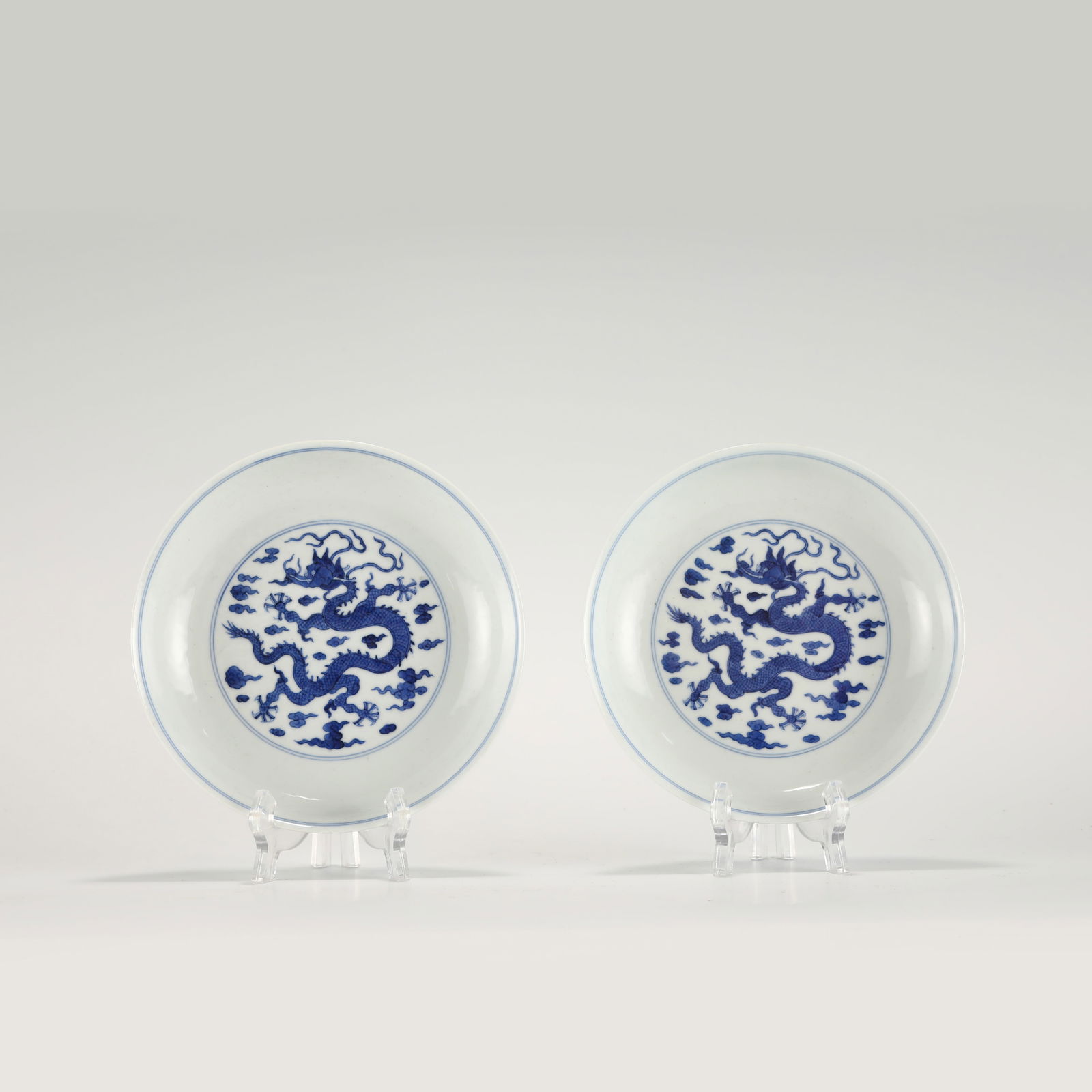 BLUE AND WHITE DRAGON PLATE, ZHIYUANTANG MARK: PROVENANCE: From Bluffton, SC Private Collector. Dimensions: Height: 3.6 cm,cm, Diameter: 17.5 cm Pair of Chinese Qing Dynasty Blue and White Dragon Porcelain Plates with Zhiyuantang Mark. The plates