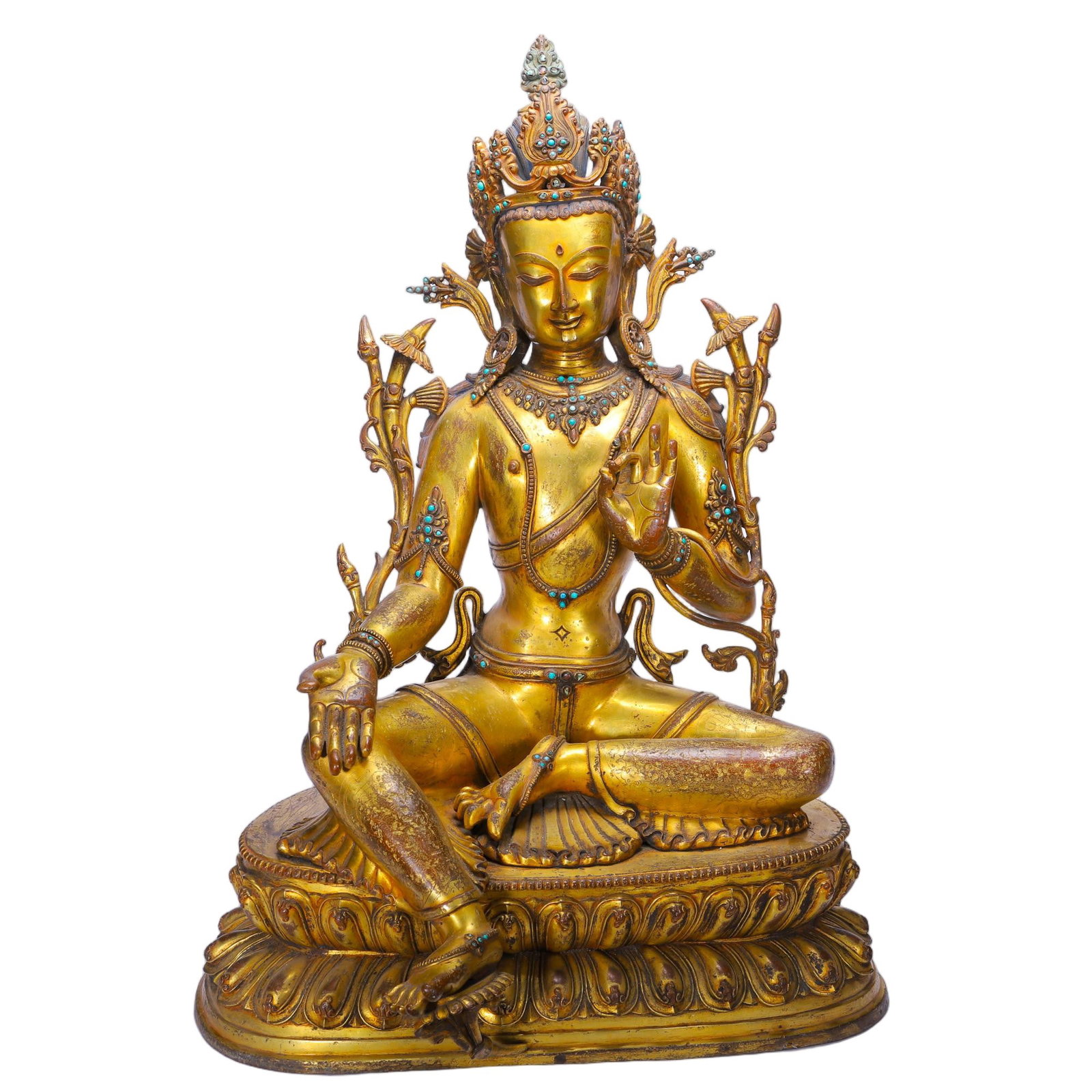 A CHINESE GILT BRONZE TARA SCULPTURE: Weighing 24480 grams and measuring 45 cm long, 40 cm wide, and 63 cm tall, this imposing gilt bronze Tara adopts a relaxed seated lotus posture atop a deeply carved double-lotus pedestal. Her intricat