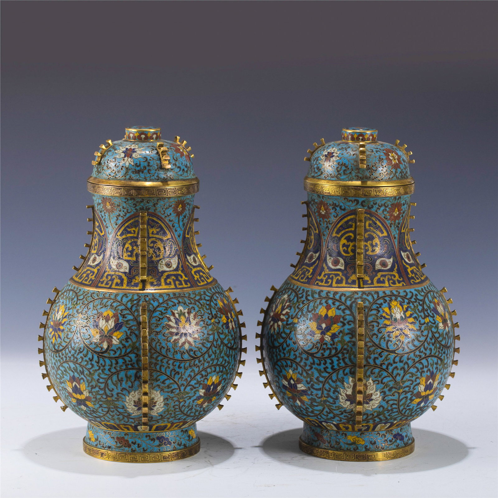 PAIR OF JINGTAI GILT BRONZE CLOISONNE VASES: Measurements: Length: 19.8cm, Width: 19.8cm, Height: 31.8cm, Weight: 6050g Pair of Chinese Ming Dynasty Jingtai Gilt Bronze Cloisonne Vases. Cast from high quality fine in a bottle shaped vase, large,