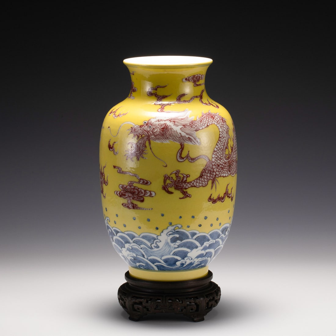 QING QIANLONG YELLOW GLAZED UNDERGLAZE RED DRAGON VASE: Dimensions: Width: 18.5 cm x Heigth: 29.2 cm Chinese Qing Dynasty QianLong Yellow Glazed Red Dragon Porcelain Meiping Vase On Carved Hardwood Stand. The porcelain potted into a traditional Meiping for