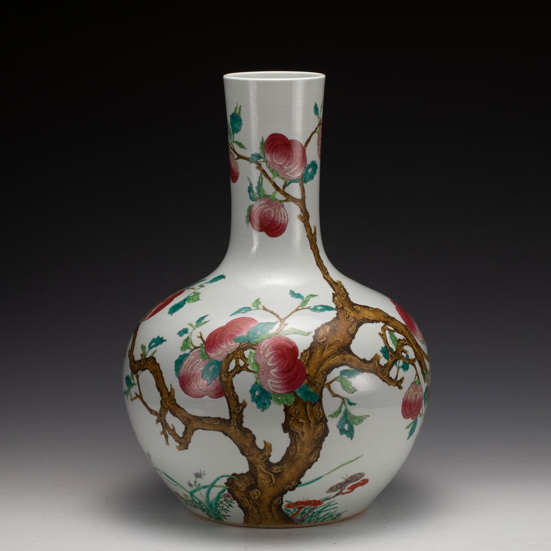 FAMILLE ROSE POMEGRANATE CELESTIAL VASE: Measurements: Width: 38.8 cm, Height: 54 cm Chinese Famille Rose Pomegranate Porcelain Celestial vase. Potted in celestial shape vase, globular lower body, cylindrical neck, close mouth rim, raised on