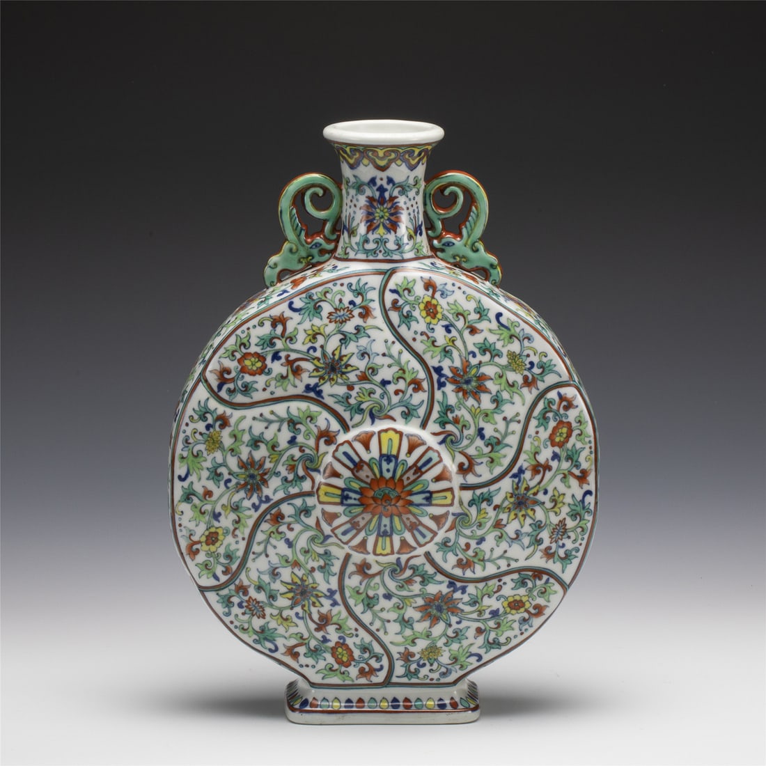 QING QIANLONG DOUCAI MOON VASE: Measurements: Length: 22.7 cm, Width: 11.5 cm, Height: 31.5 cm Chinese Qing Dynasty Qianlong Doucai Lotus Porcelain Flat Vase. Potted in moon vase, thick and tall, globular moon lower belly, straight 