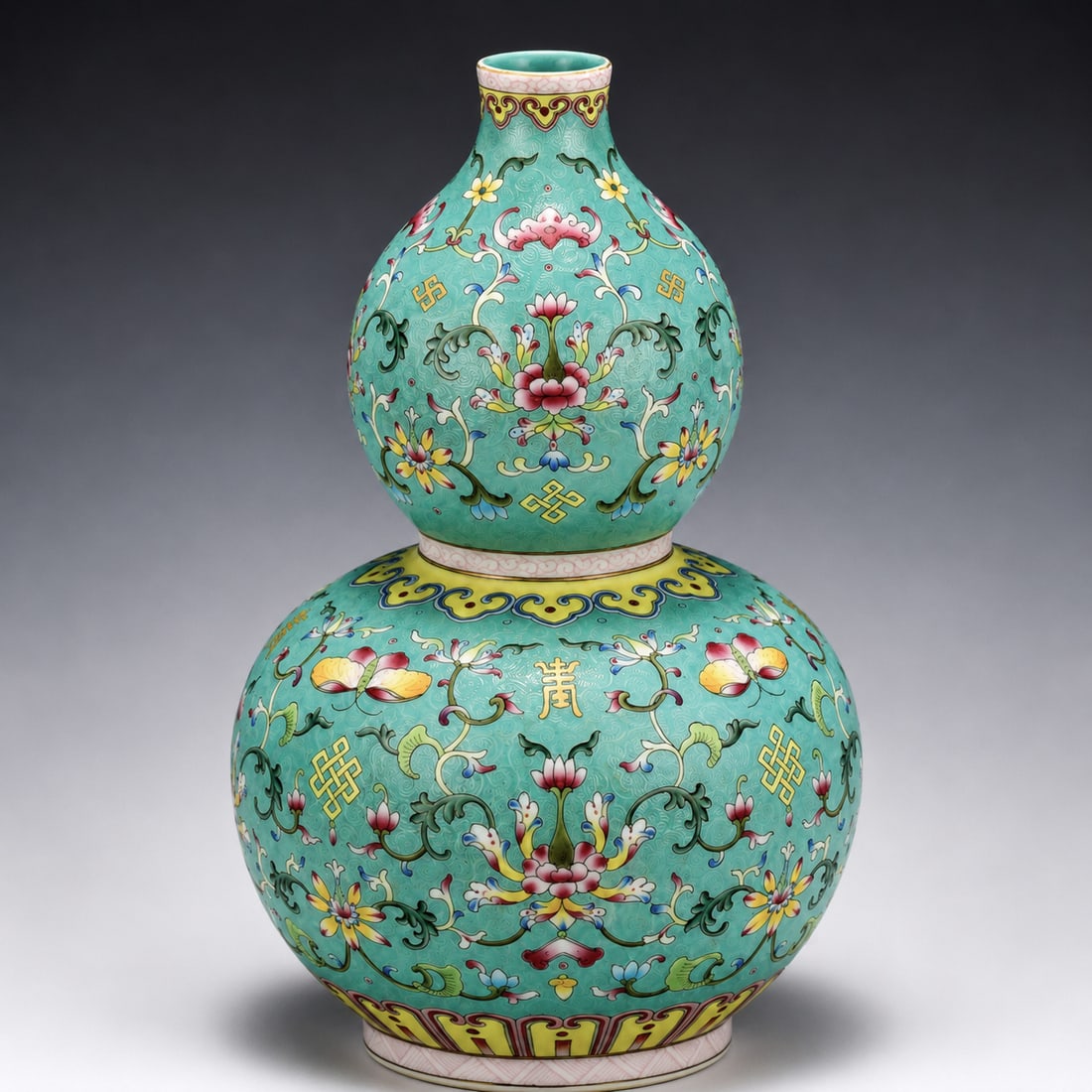 QING QIANLONG FAMILLE ROSE GOURD BOTTLE: Dimensons: Width: 18cm, Height: 30cm Chinese Qing Dynasty Qianlong Famille Rose Lotus Porcelain Double Gourd Bottle Vase. The porcelain potted with a shallow body, slight deep, thick, flaring rim with