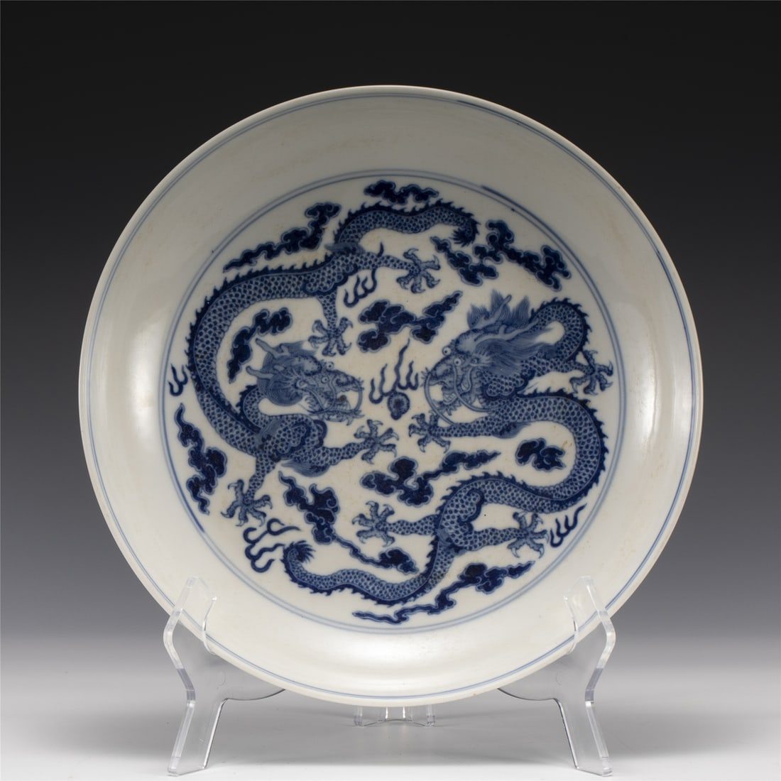 QING GUANGXU BLUE & WHITE PLATE: Dimensions: Width: 27.8 cm, Height: 5.8 cm Chinese Qing Dynasty Guangxu Blue and White Porcelain Plate. The plate has a broad wide central interior, rounded mouth lip, thick and large, raised on corre