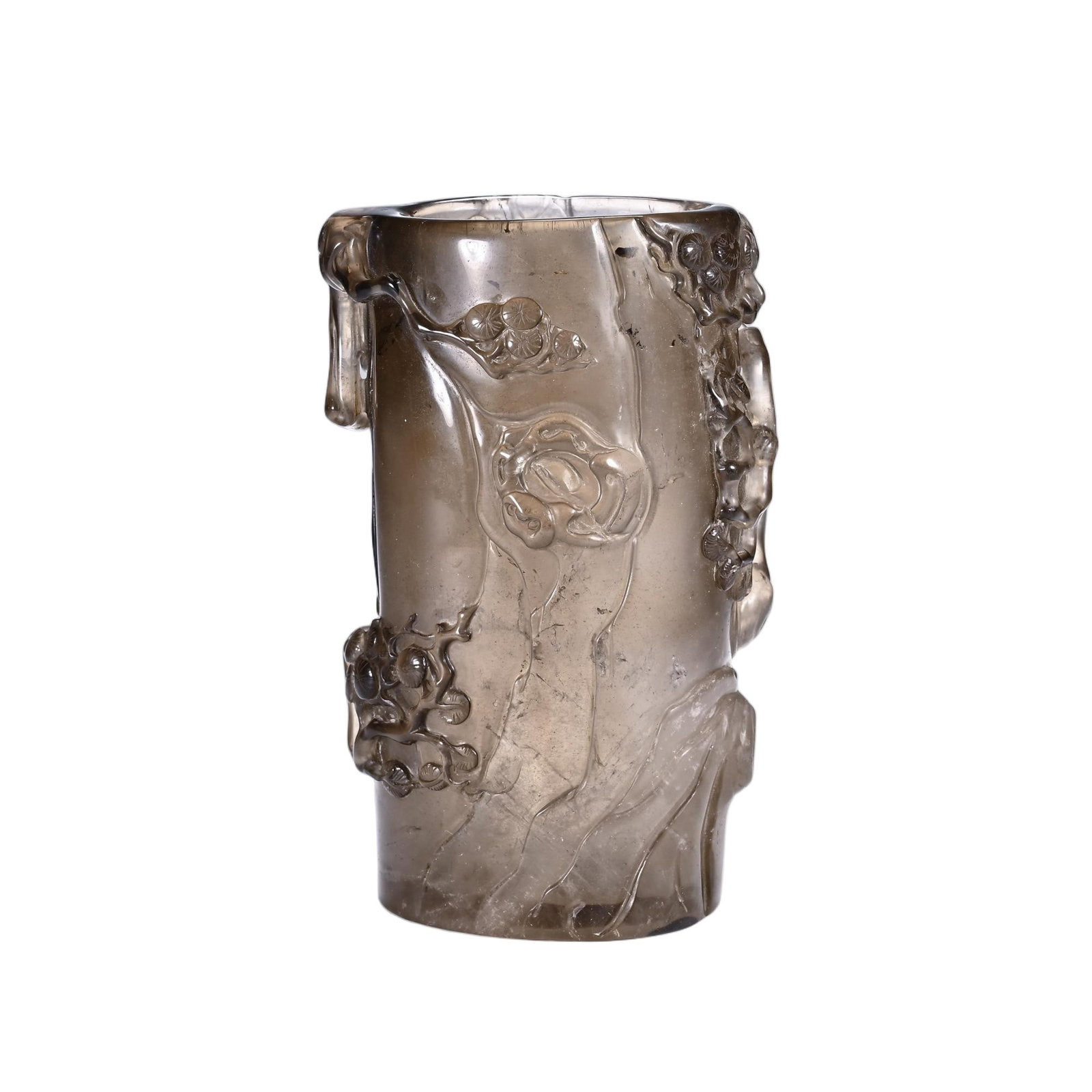 A CHINESE ROCK CRYSTAL BRUSH POT: Standing 14.8 cm in height and 9 cm in width, this cylindrical desk vessel is carved from translucent smoky rock crystal displaying natural faint internal veining that lends organic depth to its surfa