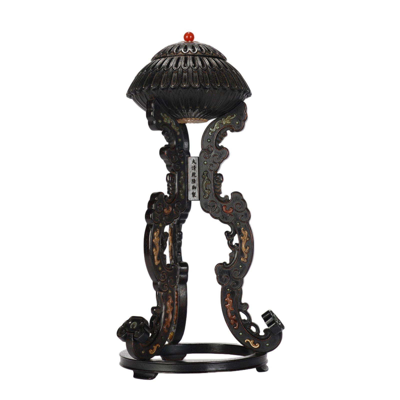 A CHINESE ZITAN WOOD HAT STAND: Expertly fashioned from dense, dark zitan hardwood, this elegant hat stand features intricately scrolling openwork supports adorned with delicate gilt and colored inlaid dragon scroll motifs. Its dome