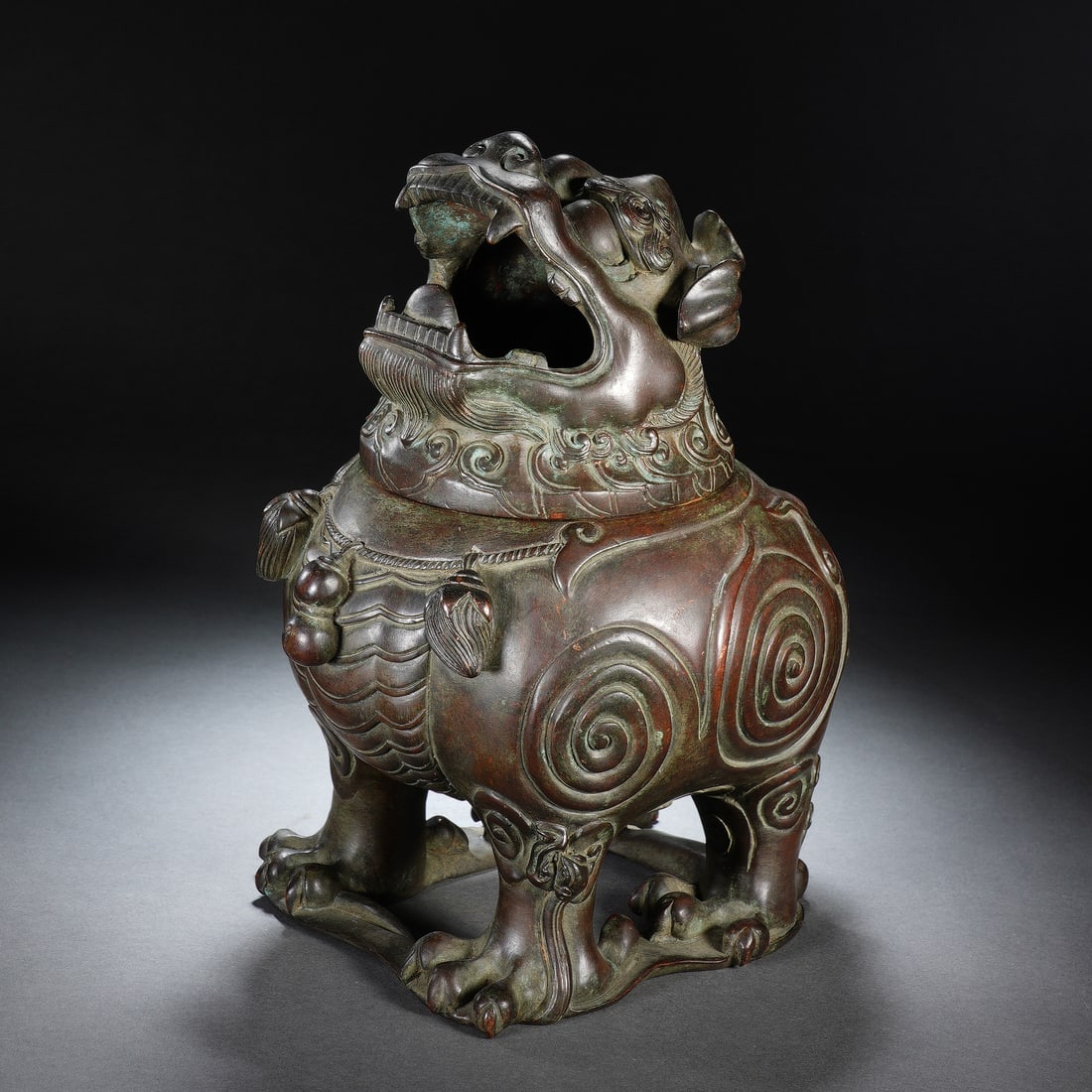 A CHINESE BRONZE MYTHICAL BEAST CENSER (1 of 11)