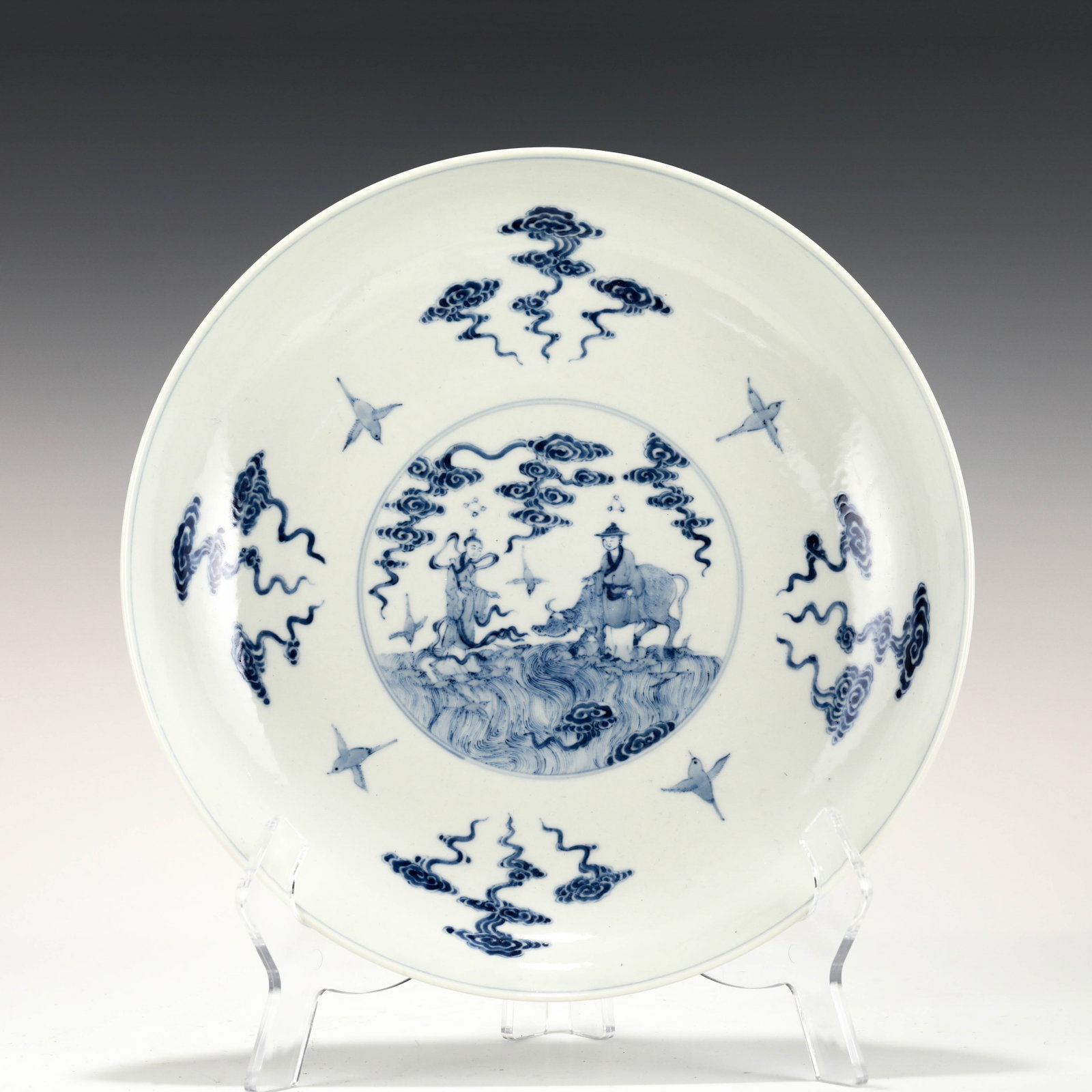 QIANLONG BLUE & WHITE IMMORTAL PLATE: Dimensions: Height: 6 cm, Diam.: 27.5 cm Chinese Qing Dynasty Qianlong Famille Rose Plate Figure Motif Porcelain Plate on Stand. The plate has a broad wide central interior, rounded mouth lip, thick a