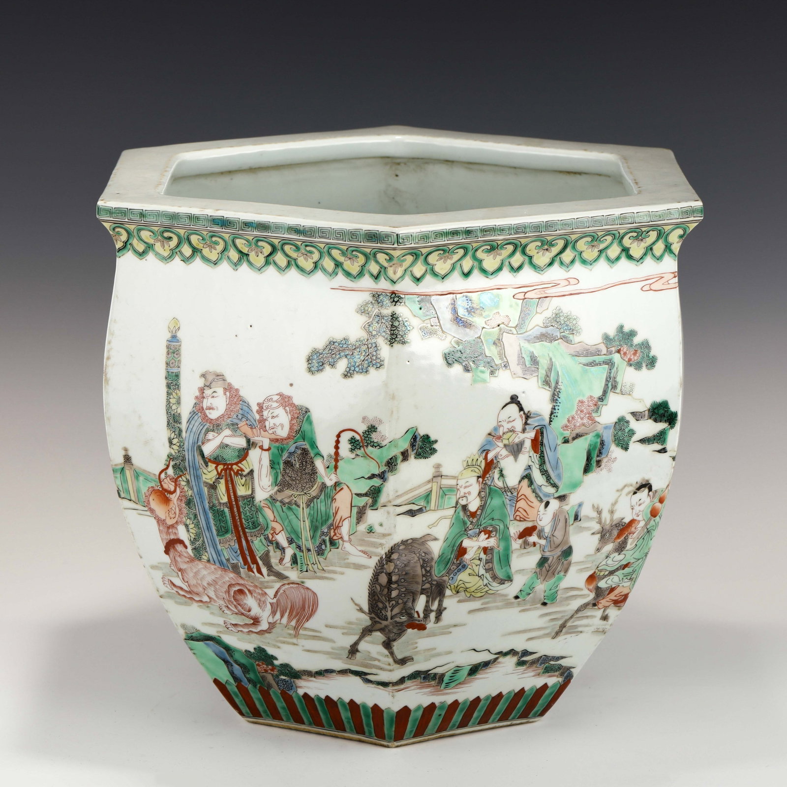 QING KANGXI WUCAI HEXAGONAL FISH POND: Dimensions: Height: 37.5 cm, Diam.: 45.5 cm Chinese Qing Dynasty Kangxi Wucai Motif Hexagonal Porcelain Fish Pond. The porcelain potted with a hexagonal shallow body, large, dep and thick, short neck,