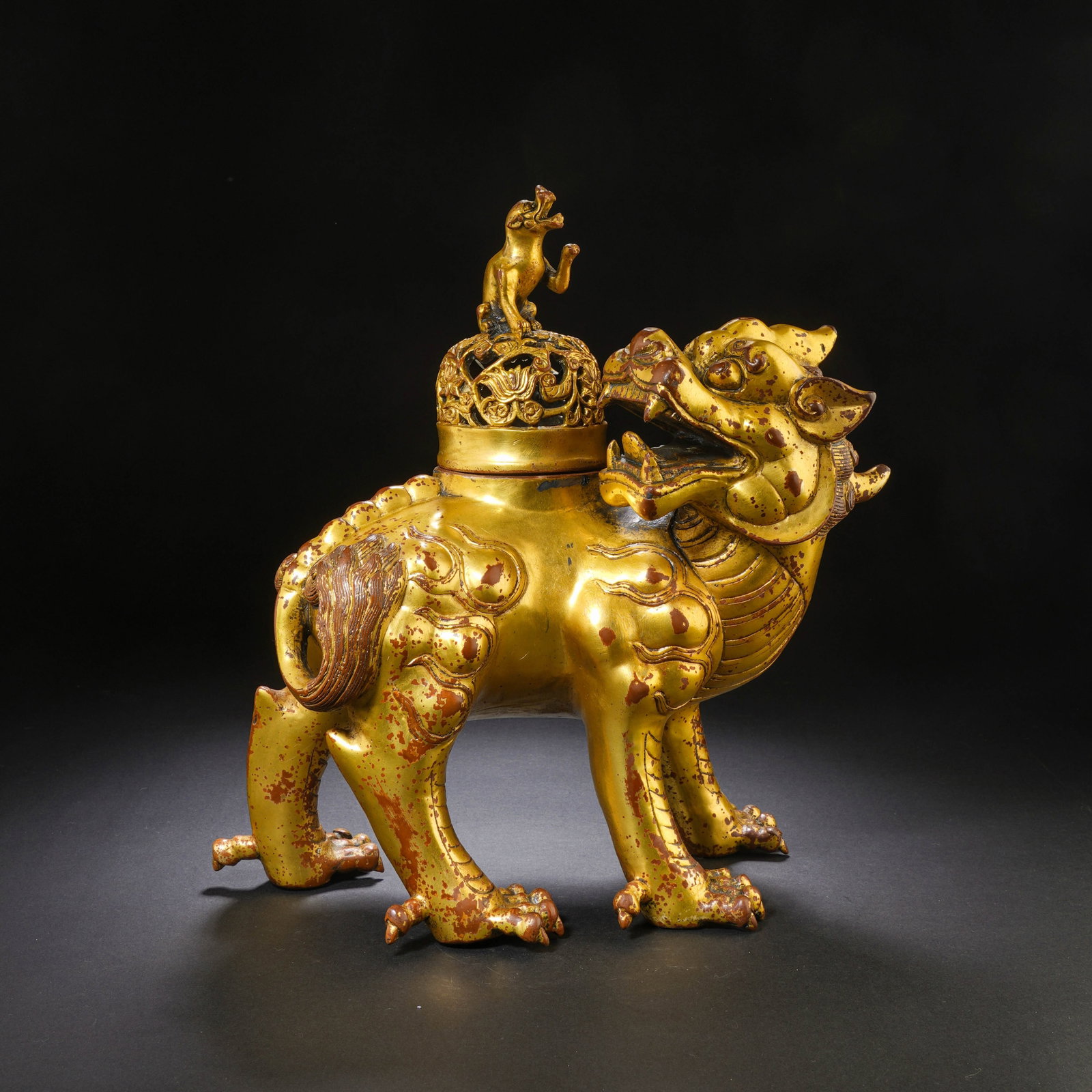 A CHINESE GILT BRONZE MYTHICAL BEAST CENSER (1 of 7)