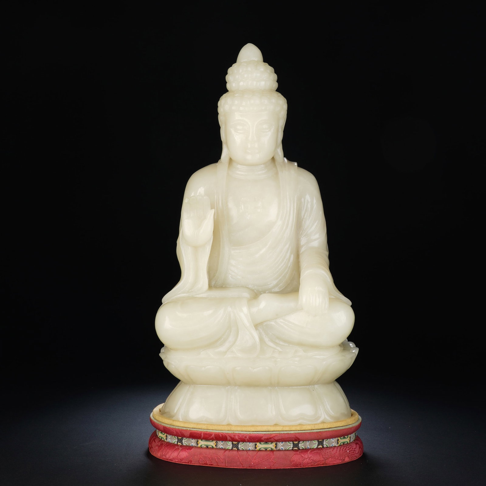 A CHINESE WHITE JADE SHAKYAMUNI SEATED FIGURE (1 of 13)