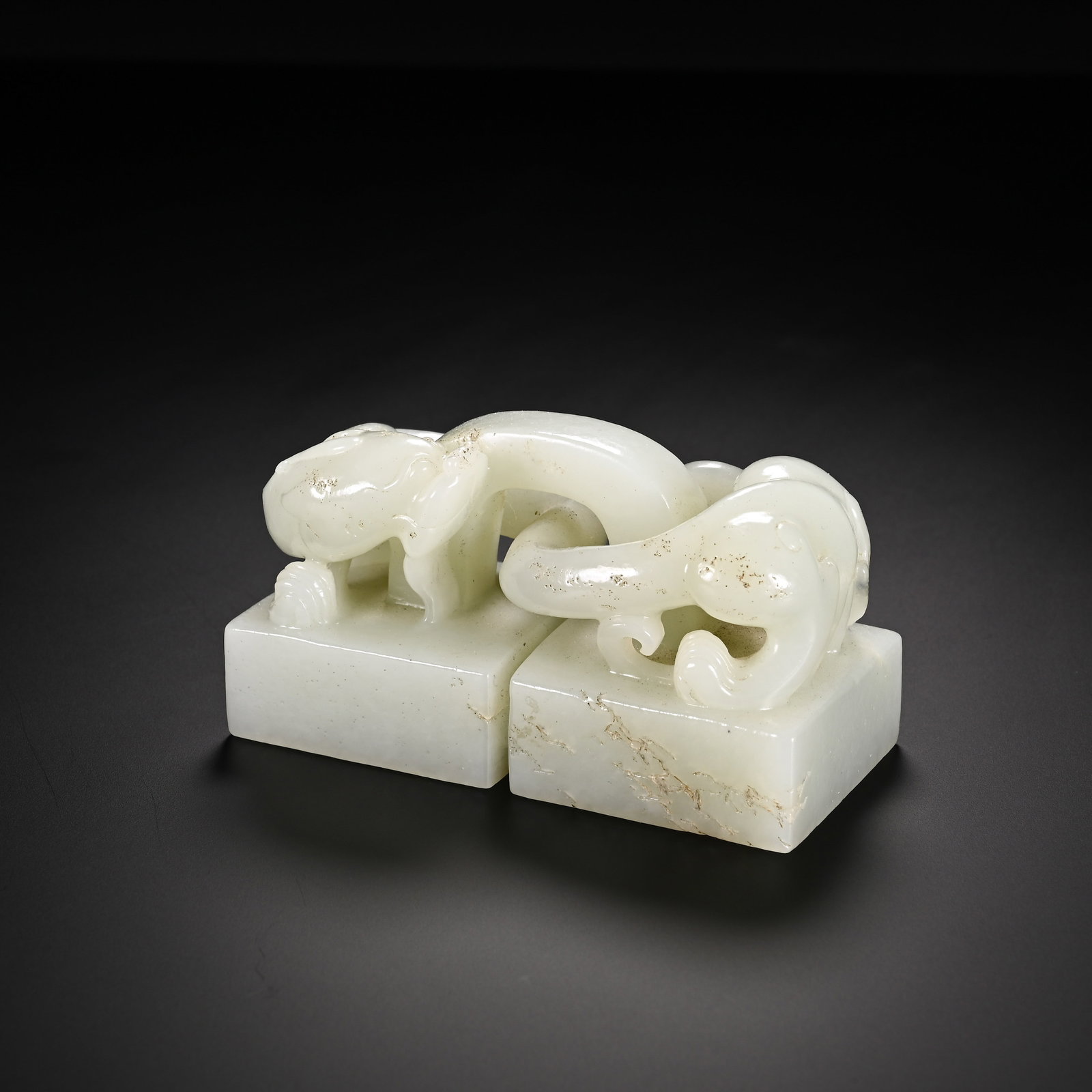A CHINESE HETIAN DRAGON JADE DUAL SEAL (1 of 7)