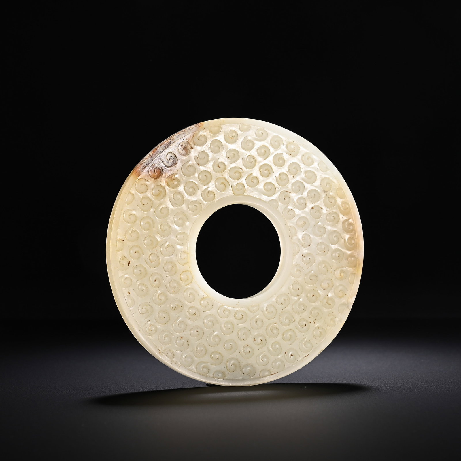 A CHINESE GRAIN PATTERN JADE BI DISC (1 of 6)
