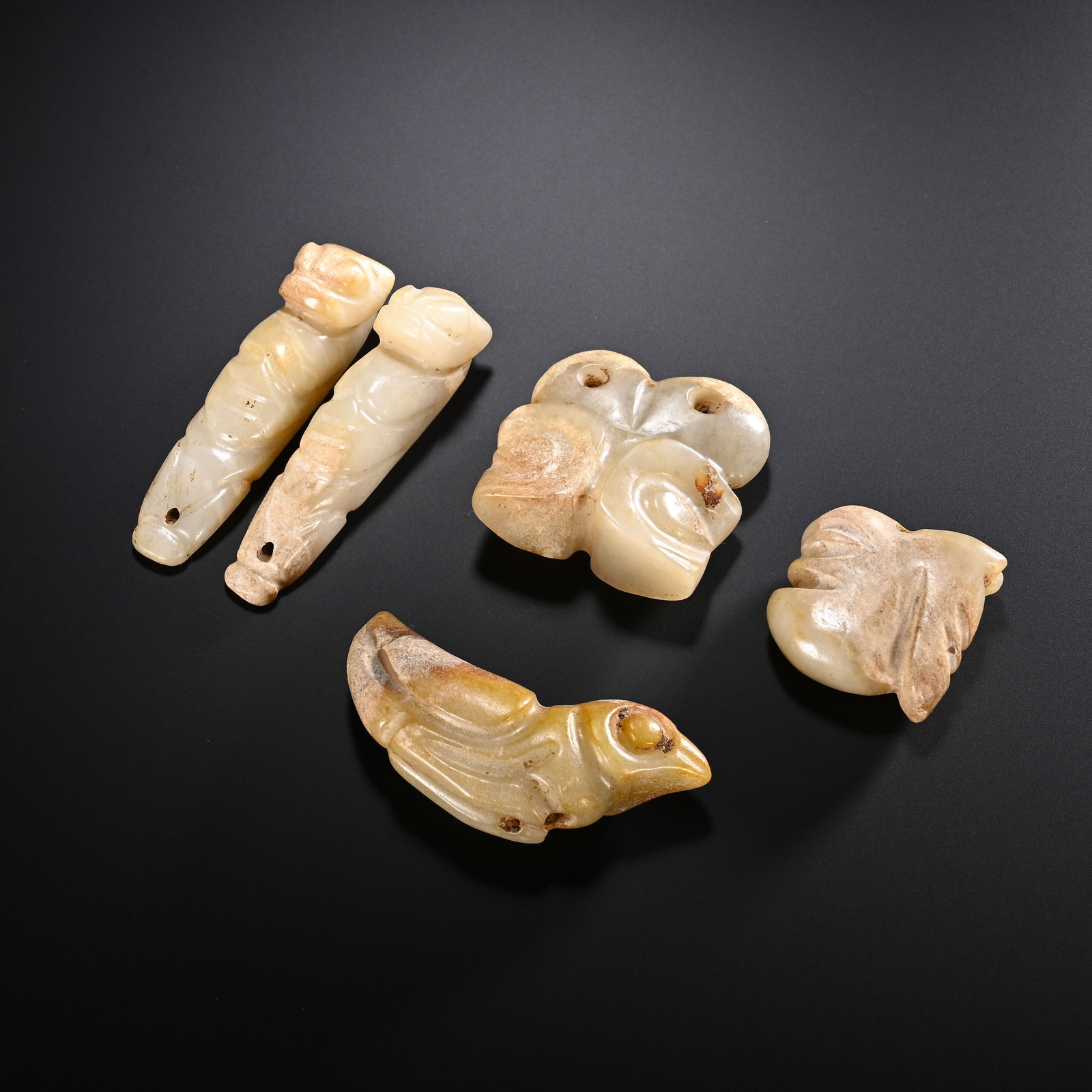 A GROUP OF CHINESE JADE PENDANTS (1 of 8)