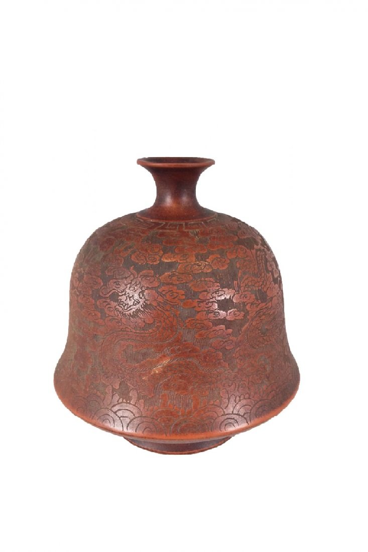Antique Chinese ZiSha Pottery Jar: China, 19th C.,ZiSha Pottery Jar in bell form body, having flared rims, footed base. Expertly Carved delicate dragons amidst Scrolling clouds in details on geometric lines ground. Mark on Base, 6 Char