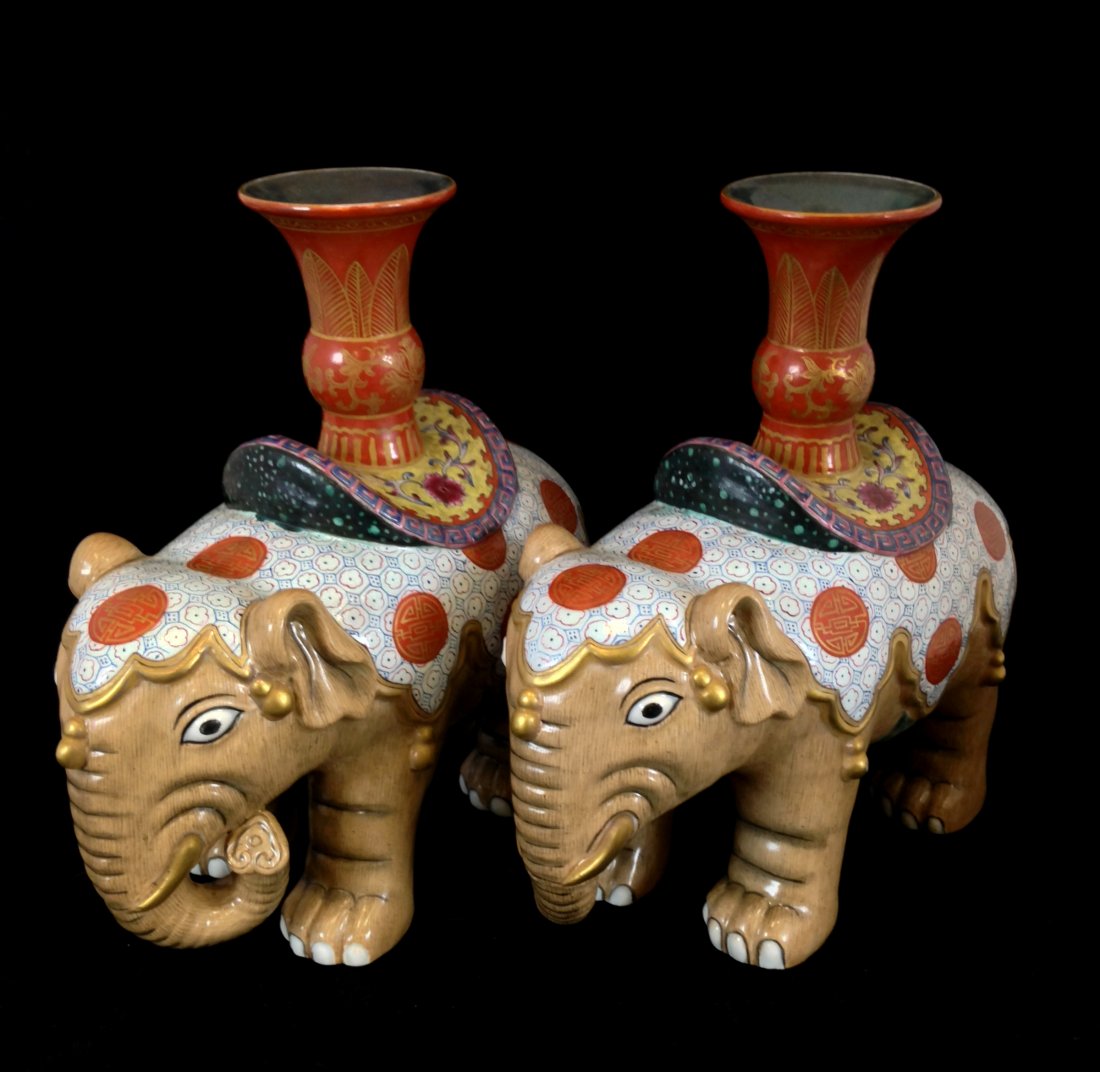 Pair of Chinese Export Porcelain Elephant Candle Holder: Unusual Pair of Chinese Export Porcelain Candle Holders, 18th/19th c., each modeled in the form of a caparisoned standing figure of an elephant and orange vase atop the blanket with an inverted neck 