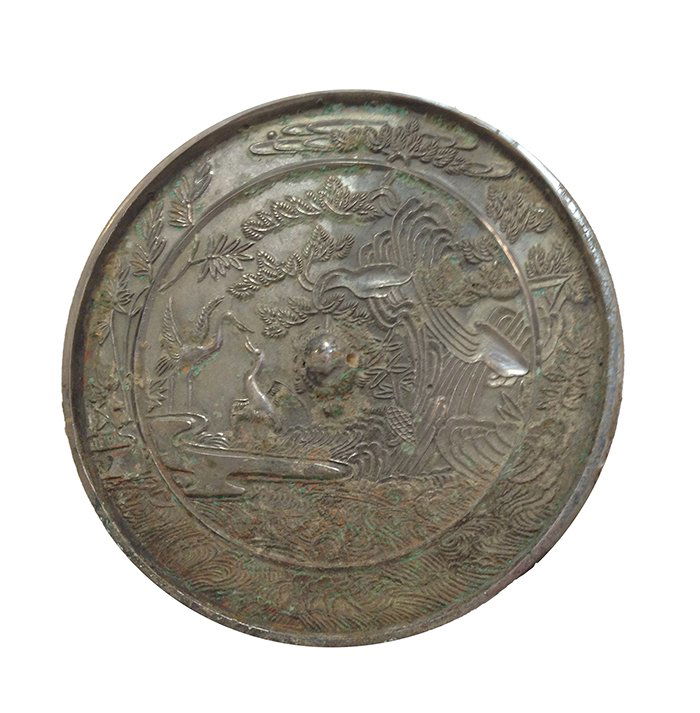 Chinese Han Dynasty Bronze Mirror: Chinese Han Dynasty Bronze Mirror, decorated in relief depicted pair of cranes amidst trees folliage blossoms in waterside nature landscaping scene. Measure: 8 1/4" Diameter
