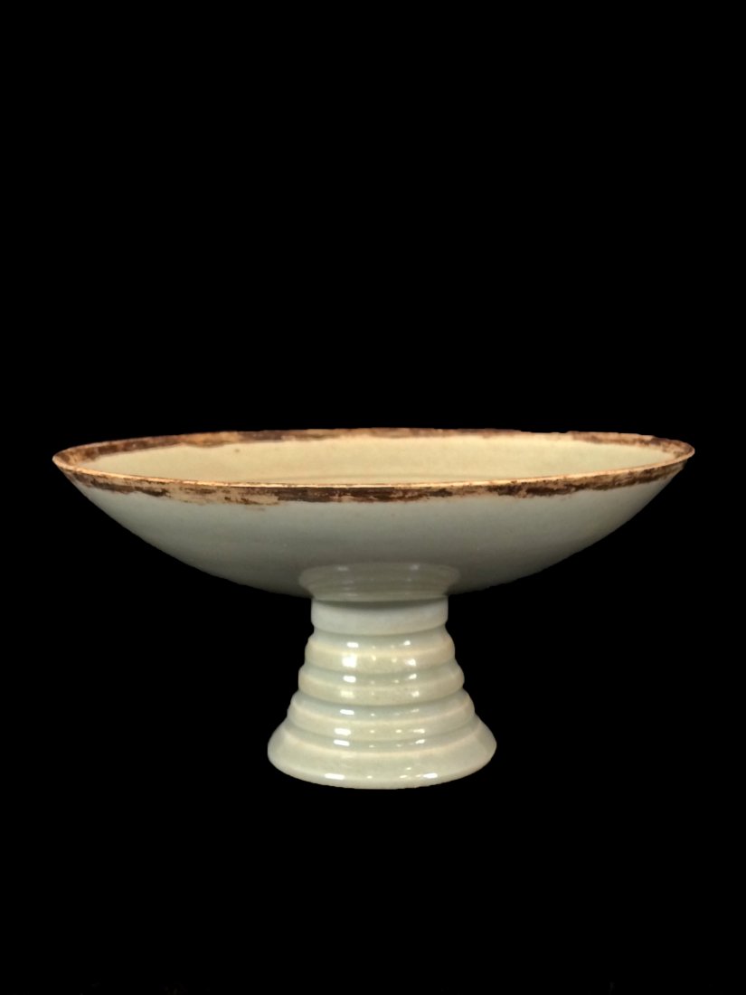 Chinese Song Period Ding Ware Chalice: Pair of Chinese Song or Song style Ding Ware bowl (960-1279 AD). Having incised lotus flower and leaf designs, thinly potted, unglazed rims, raised on circular splayed foot. , in good condition with m