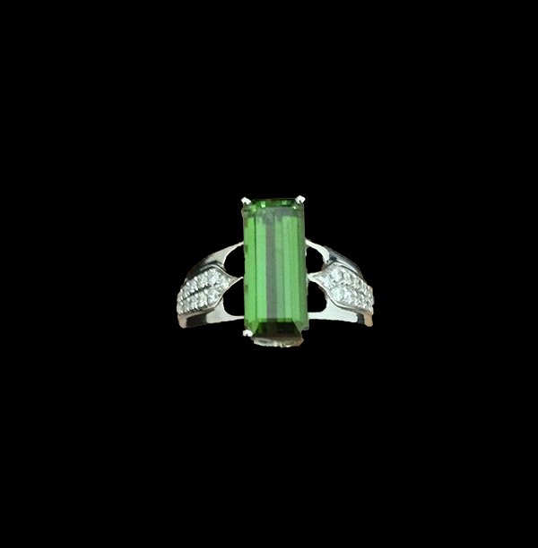Green Tourmaline White Gold Ring: measure: 23 1/2 mm Height (stone to outer band) 16 mm width (outer band)4.1 grams totalmarked : G 18K Tiffany & CO
