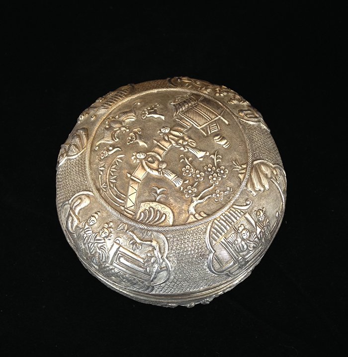19th C Antique Chinese Export Silver Jewelry Trinket: China, of Flatted Circular shapped body, covered Silver Trinket Box. Dense decorated with various figures reliefs in landscape scenes. Measure: 3 7/8" Diameter, 2 3/4" Height approx 217.2 grams (6.98 