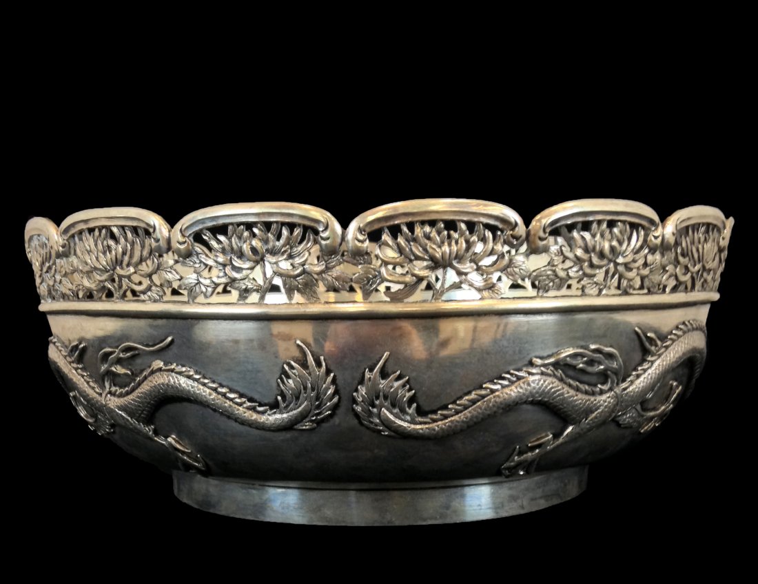 19th C Antique Chinese Export Silver Dragon Repousse: CHINESE EXPORT SILVER BOWL - Large late 19th c. Chinese Export Footed Silver bowl with reticulated top rim, marks of Hung Chong & Co. (Canton & Shanghai). Decorated with high relief double dragons aro