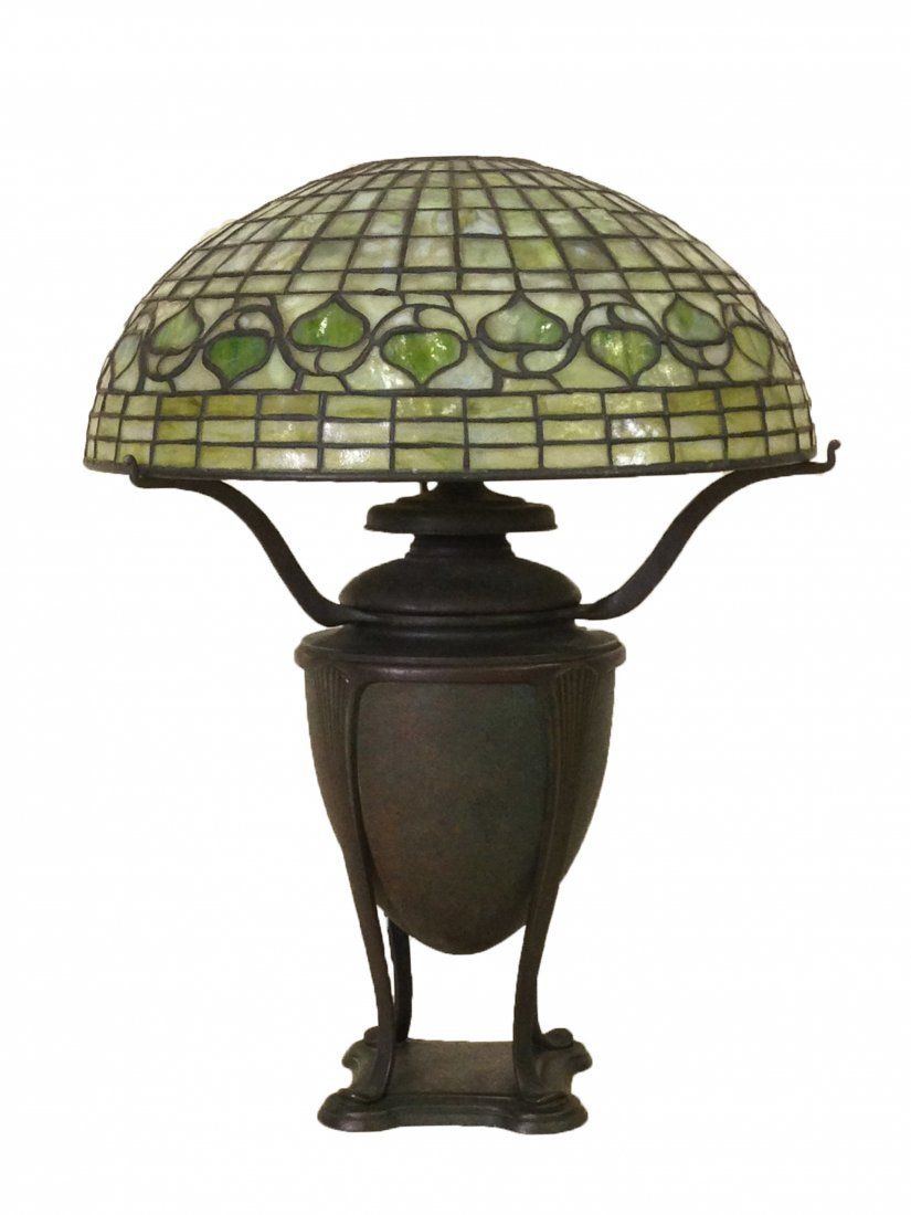 Tiffany Studios NY Leaded Glass Acron Table Lamp: Tiffany Studios New York - Acorn Pattern Bronze Table Lamp. The patented bronze lamp has an oil font insert which is signed, 'TIFFANY STUDIOS NEW YORK No. 2129.' The lamp is fitted with the original T