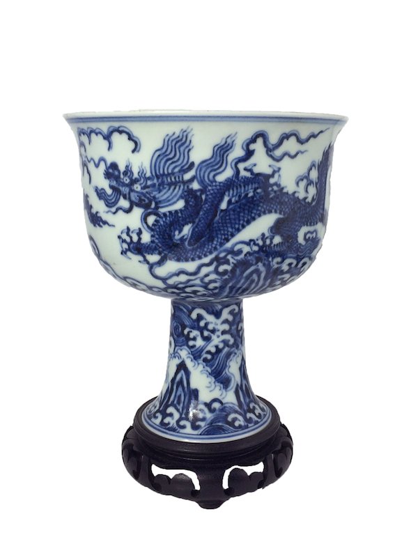 Chinese Blue and White Porcelain Chalice on Stand: China, Blue and White sytle porcelain chalice, flared rim raised on splayed foot. finely decorated with imperial five-toed Dragon amids the clouds, inner interior banded with geometrical pattern on ri