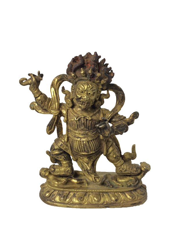 Antique Gilt Bronze Buddha: Antique Sino-Tibetan gilt bronze Tantric Buddha figure of Mahakala. Having fierce face, right hand raised holding a mythical weapon instrument, standing in hunter position upon a lotus throne base.Mea