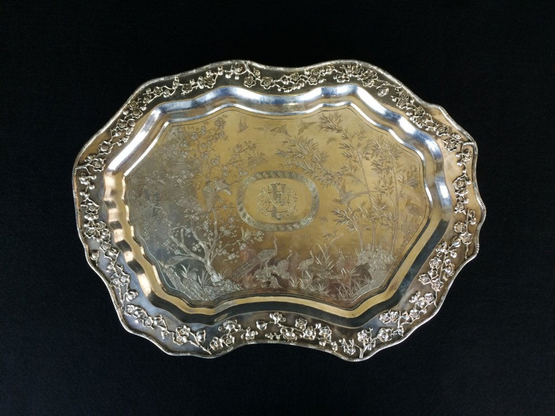 ANTIQUE CHINESE EXPORT SILVER TRAY, LUEN WO, 19/20th C: 19th/20th C Antique Chinese Export Silver Tray, Luen Wo, A Chinese Export Silver Tray, Luen Wo, Shanghai, Late 19th C, shaped oval, the border applied with prunus, the surface engraved with peacocks,