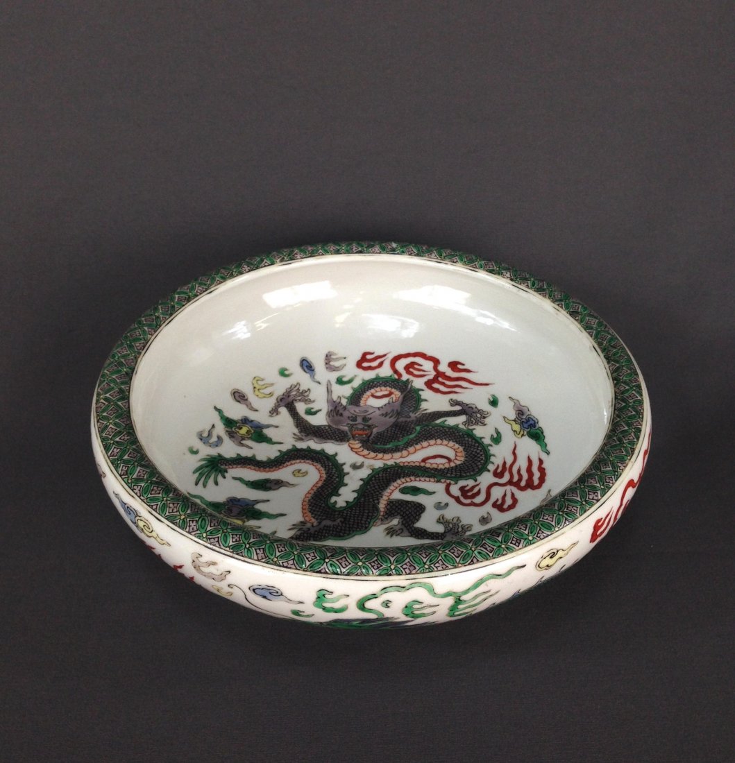 CHINESE KANGXI WUCAI BRUSH WASHER: Chinese KangXi WuCai Brush Washer. Bright decorated with imperial Five-Toed dragons flying amidst flames and clouds. Boldly bordered with auspicious geometrical symbol on edge rim. Scattered minor gla