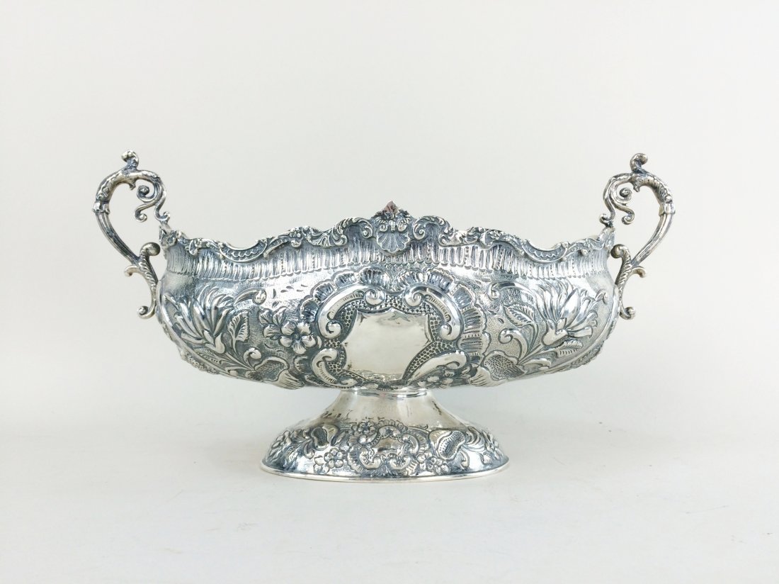 Sterling Silver Centerpiece "900", 31 Troy: Sterling centerpiece "900", having 2 enlonged barnching foliage form handles, decorated in Rococo design. Measure: 8" Height, 14 1/2" Width Approx: 31 Troy Ounce