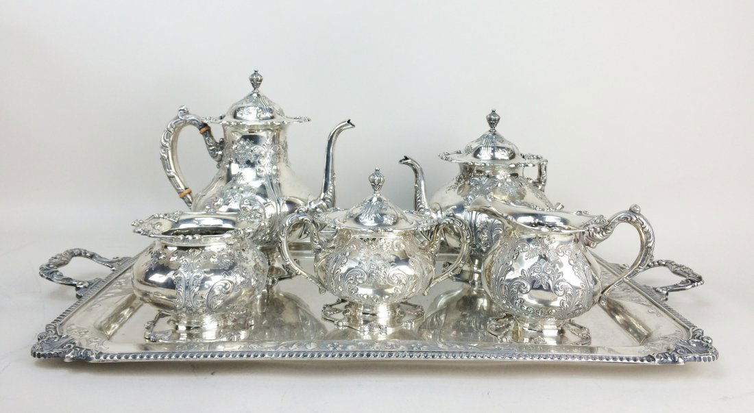 Set of 6 Pcs FRANK WHITING Silver Tea Sets, 266.69 Troy: American sterling silver coffee and tea service, Frank. M. Whiting and Co., North Attleboro, Massachusetts, (set of 6) hand chased with scrolling foliage and flowers, comprising: (1) coffee pot, 10