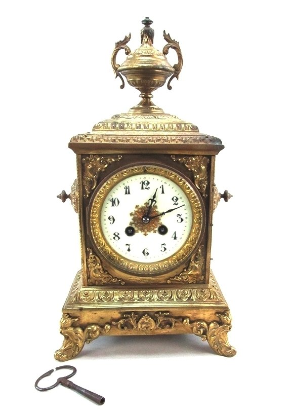 19th C Gilt Bronze Champleve Clock: 19th century gilt bronze Louis XV style Champleve clock, the clock face encircled with foliate surrounds