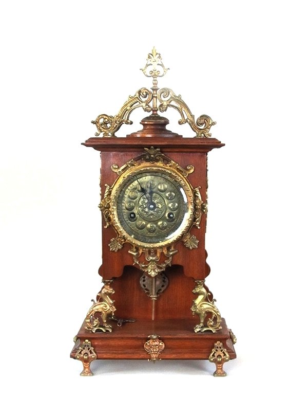 Vintage Wooden Clock: Vintage Wooden Clock with key and pendulum.
