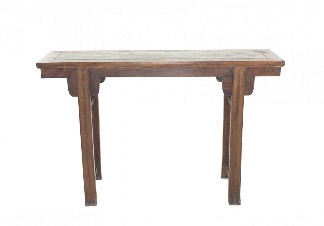 A HUANGHUALI WAISTLESS ALTAR TABLE: A Chinese HuangHuaLi Altar Table, with two-panel top set within the wide rectangular frame with beaded, 'ice-plate' edge, above plain aprons and spandrels, the whole raised on thick legs of rounded se