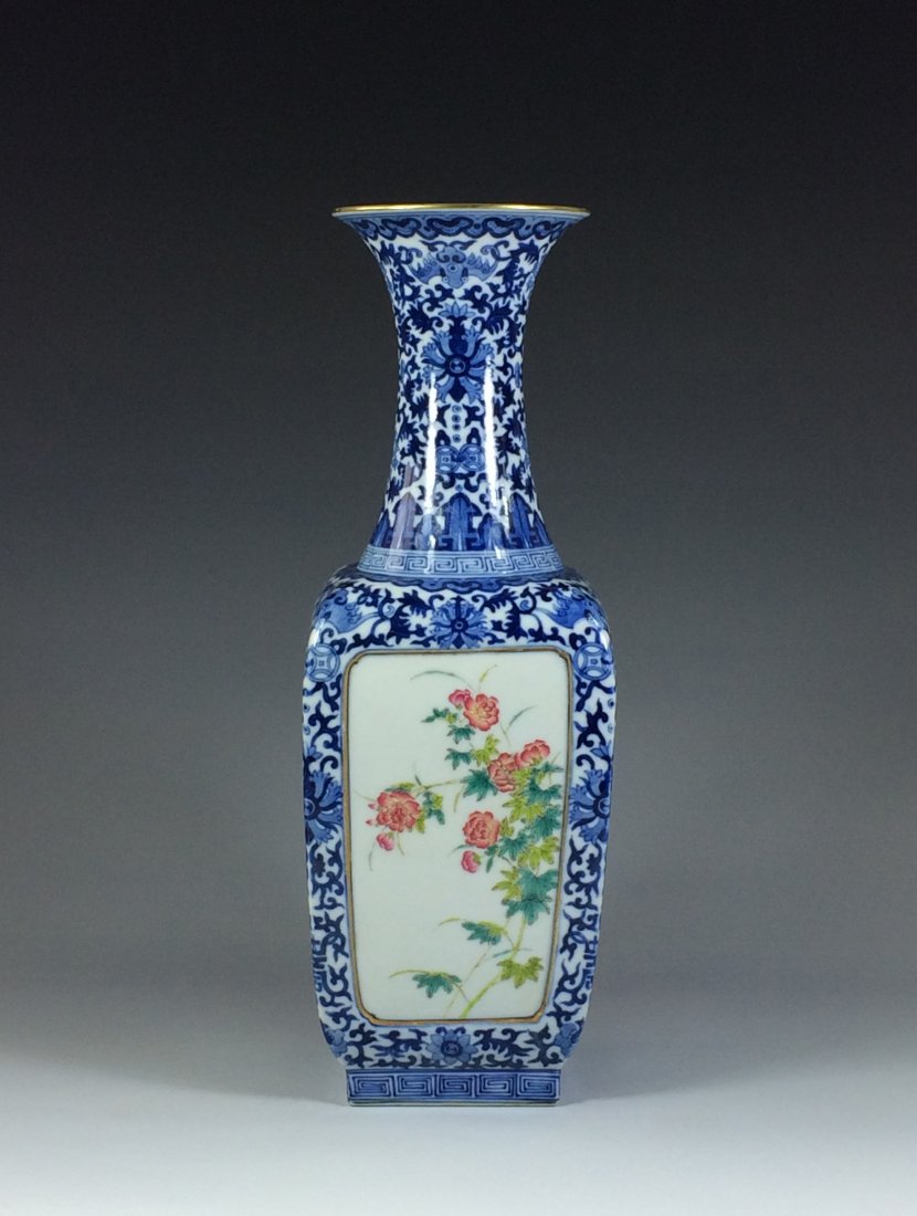 FINE CHINESE FAMILLE ROSE PORCELAIN VASE: Very Fine Chinese Famille Rose Porcelain Vase, Having baluster shaped, with squared body and footed base, elongated neck to the flared rim. The main decoration hand painted in famille rose style of ea