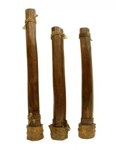 SET OF 3 PCS RARE LARGE HUANGHUALI COLUMNS: Set of 3 Rare Large Chinese HuangHuaLi Columns, Having cylindrical shape body, of natural trunk. Very dense with fine grain, showing ghost-faces patina. Stands on the natural shaped burl hardwood stan