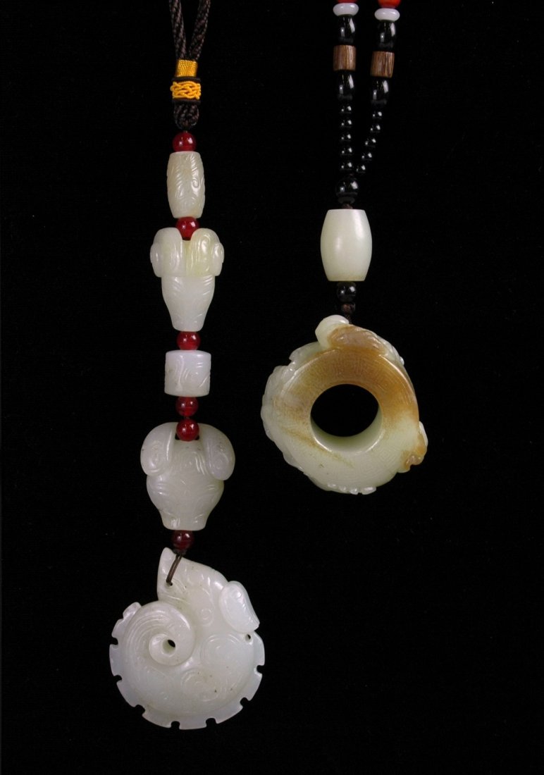 PAIR OF CARVED WHITE JADE AMULETS (1 of 8)