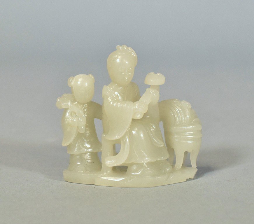CARVED JADE IN SHAPE OF FIGURES HOLDING RUYI (1 of 7)