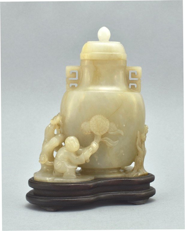 CARVED JADE BOYS PLAYING NEXT TO JAR (1 of 10)