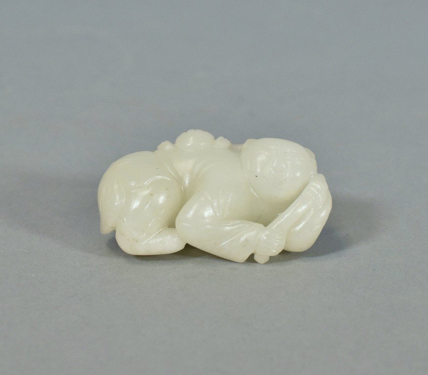 CARVED WHITE JADE, BOY PULLING  A BELT (1 of 8)