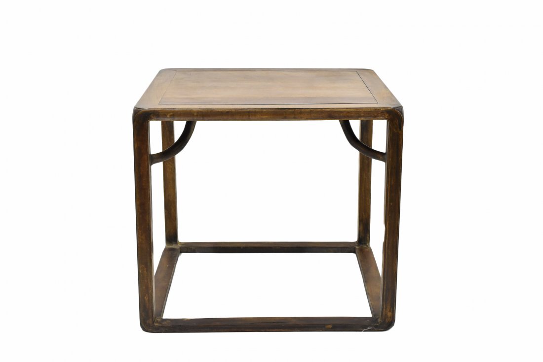 A HUANGHUALI SQUARE TABLE: Antique Chinese HuangHuaLi Square Table, very dense hardwood throughout, with curved spandrel flanked to the top legs. The frame is supported on beaded legs of square section joined by humpback stretc
