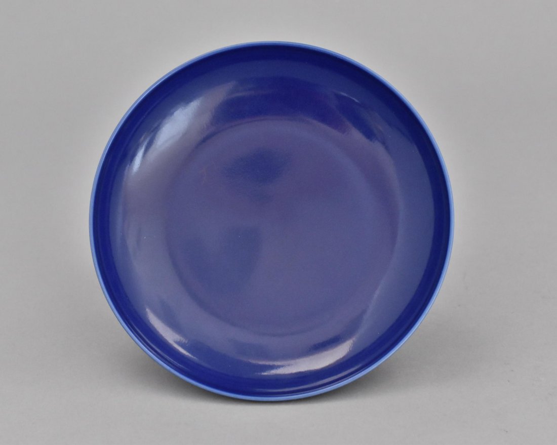 A CHINESE MONOCHROME BLUE GLAZED PLATE (1 of 4)