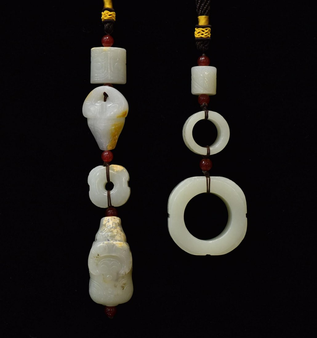 PAIR OF CARVED WHITE JADE AMULETS (1 of 7)