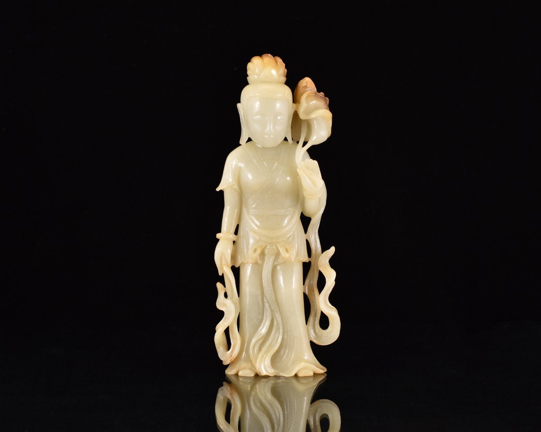 A CARVED CHINESE JADE OF STANDING GUANYIN (1 of 10)