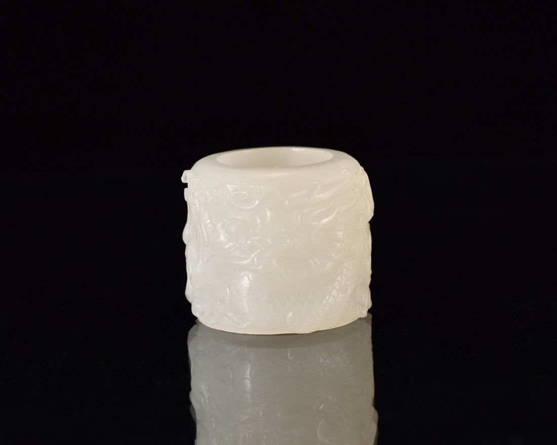 CARVED WHITE JADE DRAGON MOTIF ARCHERY RING (1 of 10)