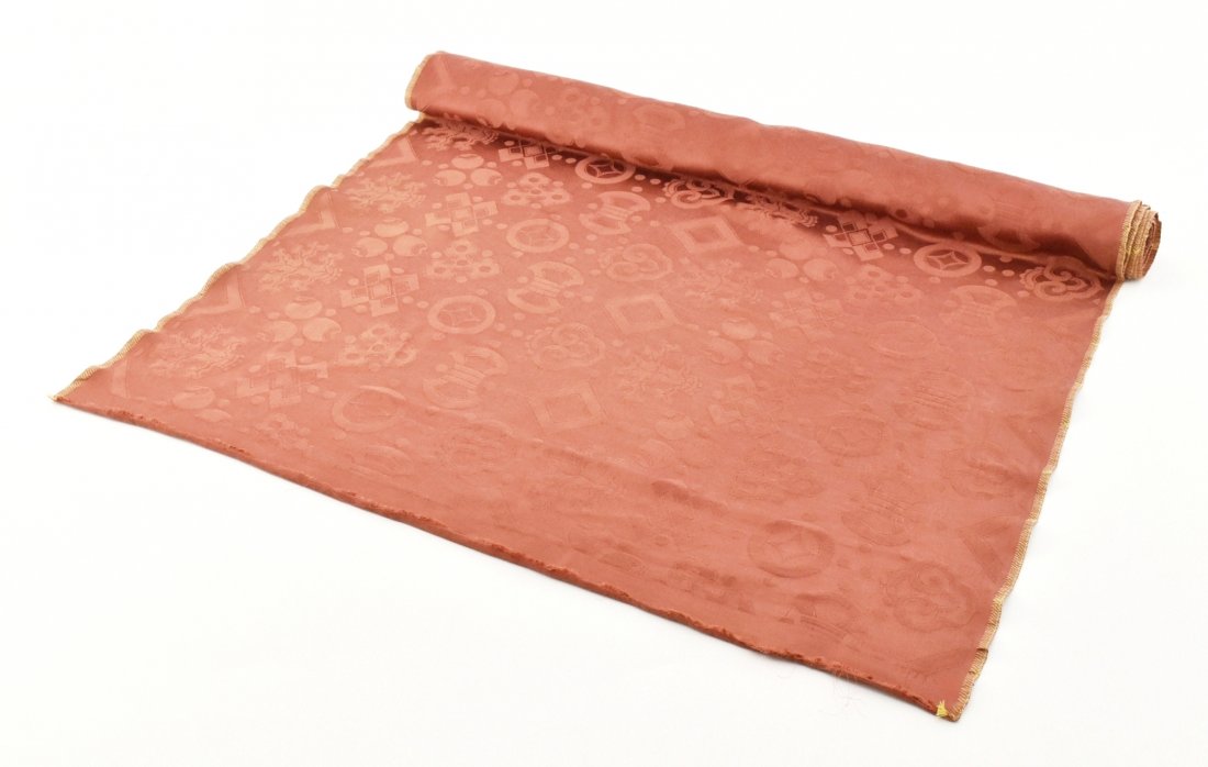 20TH C. CHINESE WOVEN RED SILK ROLL IN BAJIXIANG MOTIF: Very Fine 19th C Chinese Qing Dynasty Woven Silk Roll, Expertly weaved with metallic weft threads of "The Eight Buddhist Emblems" motif, all reserved in red ground silk cloth. Dimension: 292"L x 3