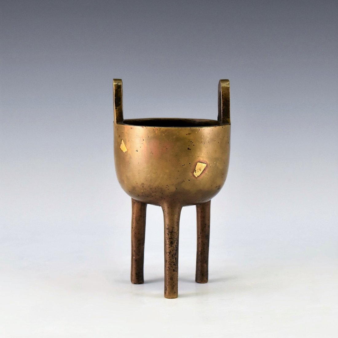 A GILT-SPLASHED BRONZE TRIPOD CENSER (1 of 10)