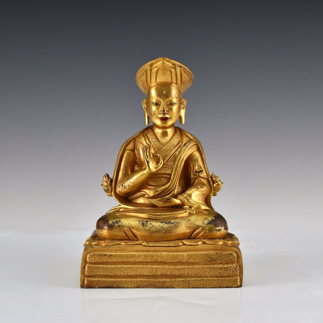 A GILT BRONZE BUDDHA FIGURE OF LAMA TSONDRU TASHI (1 of 10)