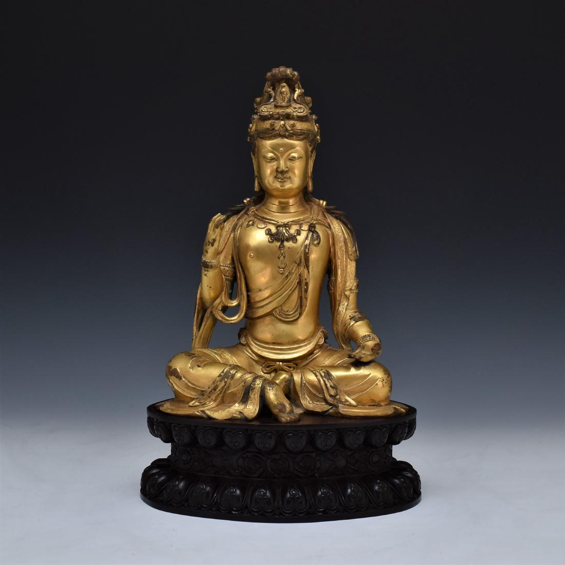 MING GILT BRONZE AMOGASHIDI BUDDHA ON WOODEN STAND (1 of 9)